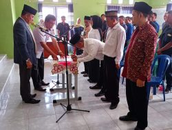 HASANI Lantik Tiga Aparatur Kampung Bandar Dalam, Tekankan Efisiensi Anggaran dan Pelayanan Prima